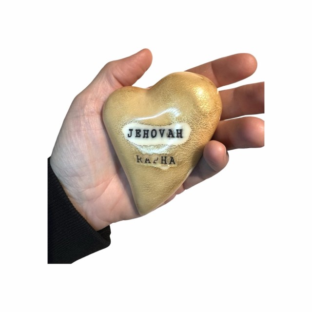 SOLGT. Medium størrelse på dette hjertet. Godt å holde i og fløyels glatt overflate.